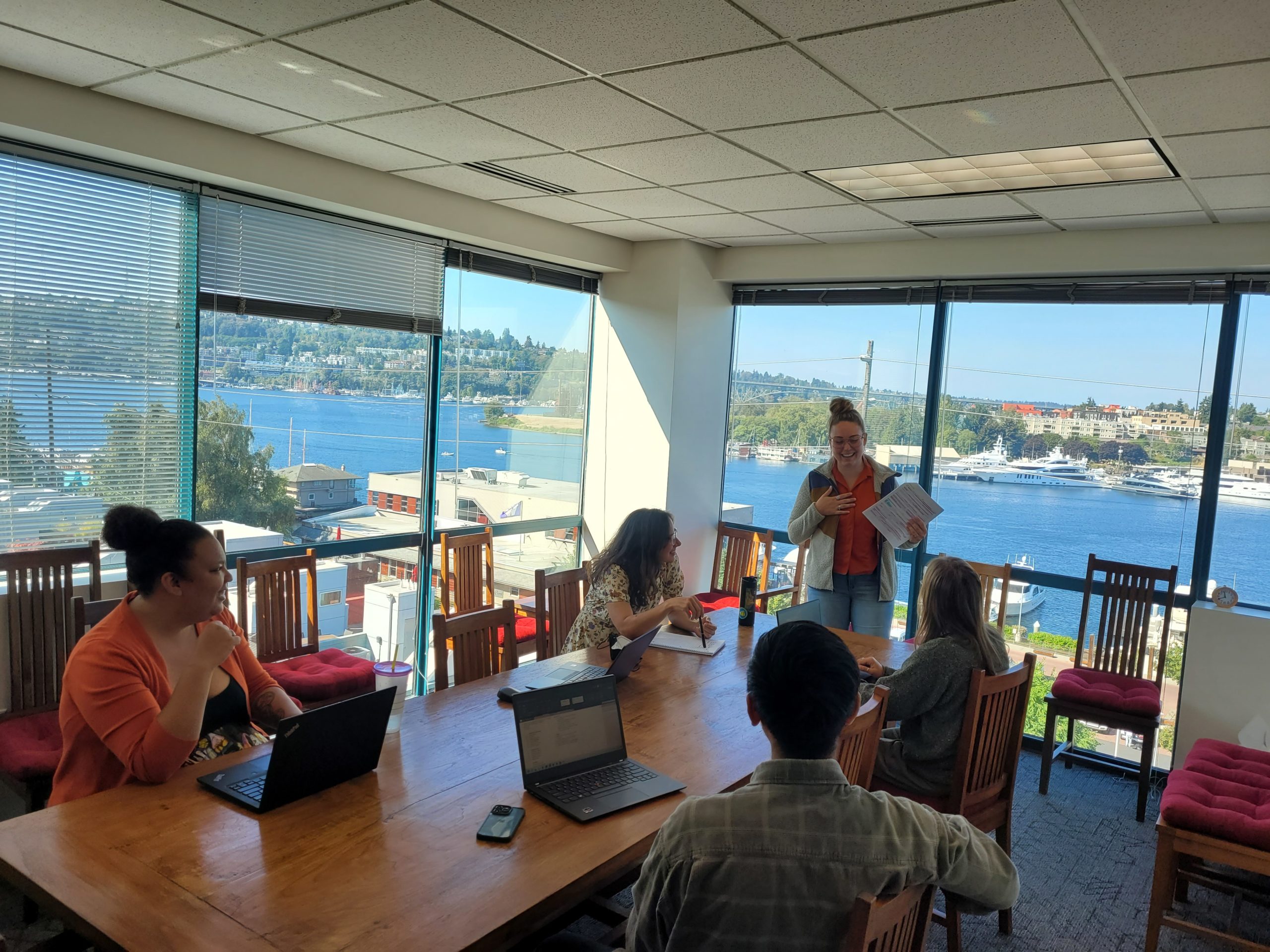 Ed Team members having a meeting in our Lakeview room