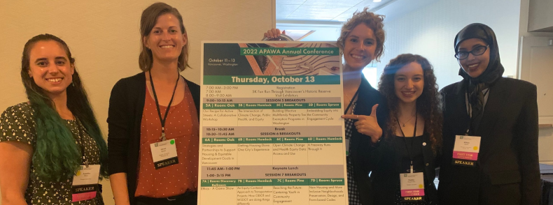 Team members with 2022 APAWA Annual Conference poster